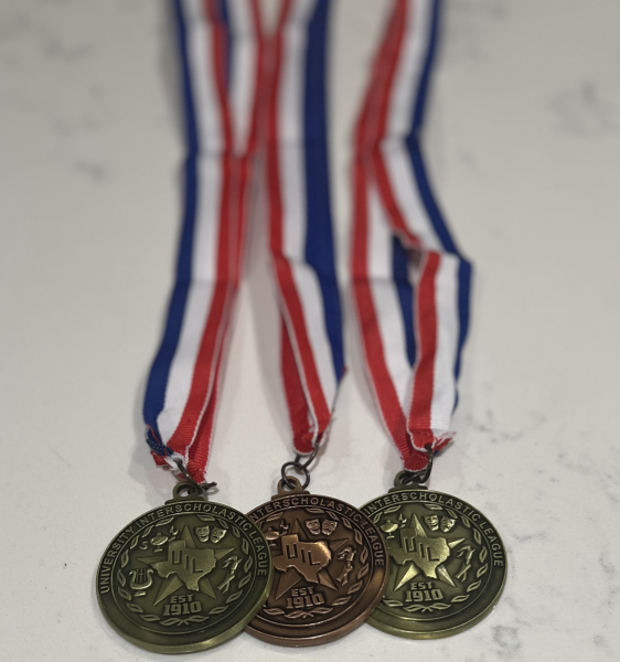Medals from UIL competition. 